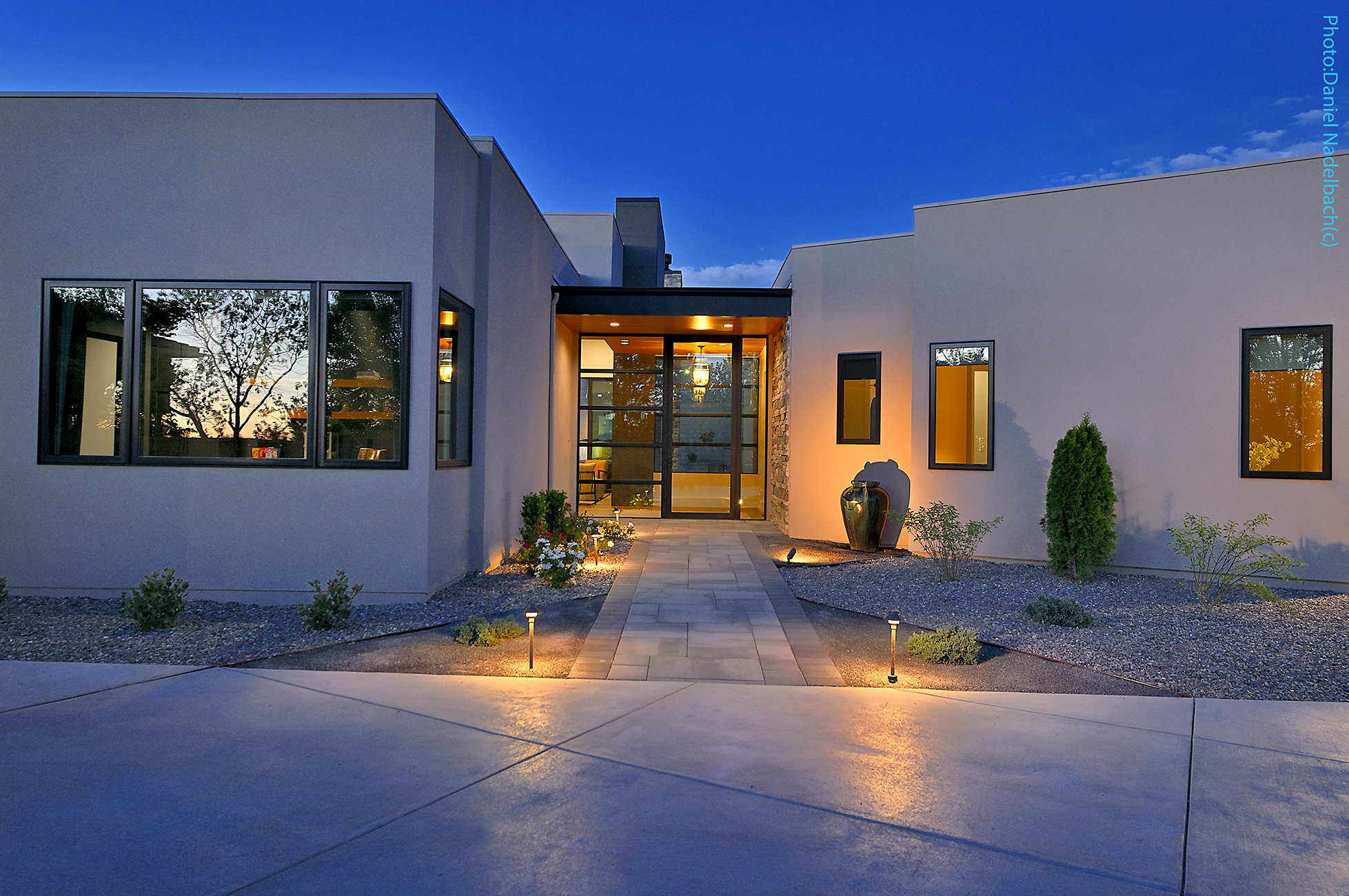 Estate exterior at night — Ella Todd Interiors